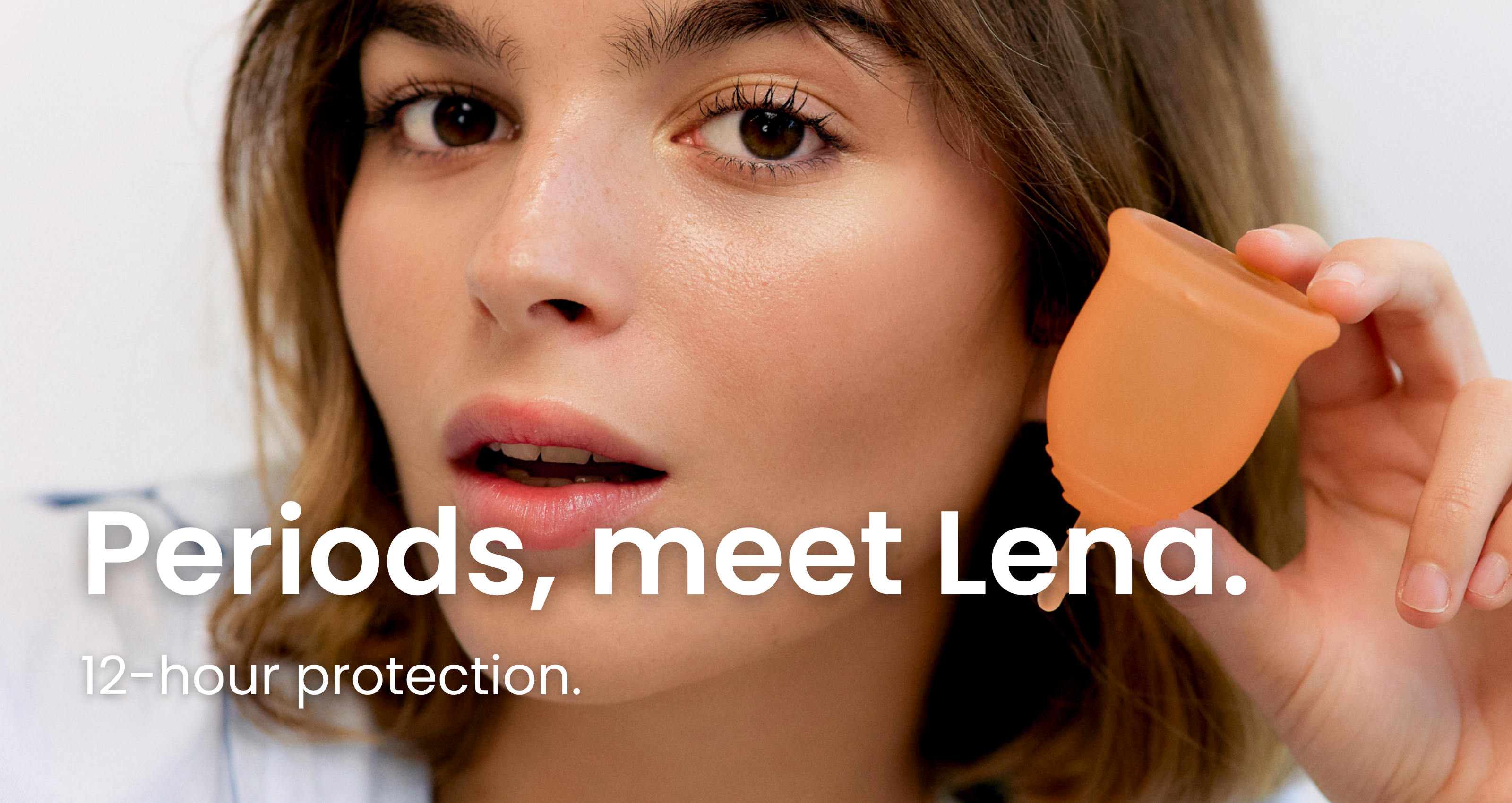 Woman holding a Lena Cup with text 'Periods, meet Lena. 12-hour protection.'