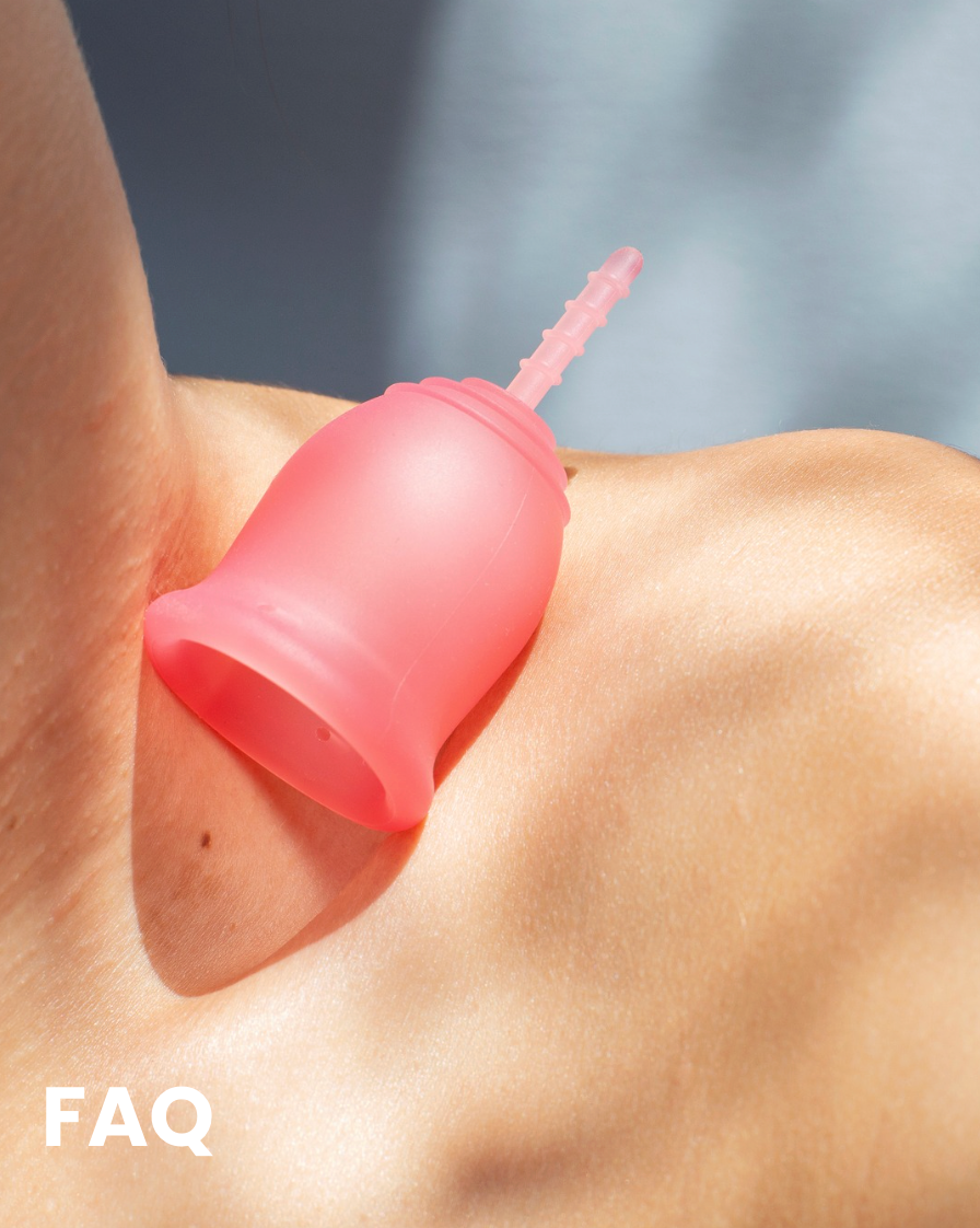 Pink Lena Cup on a person's skin with a blurred background