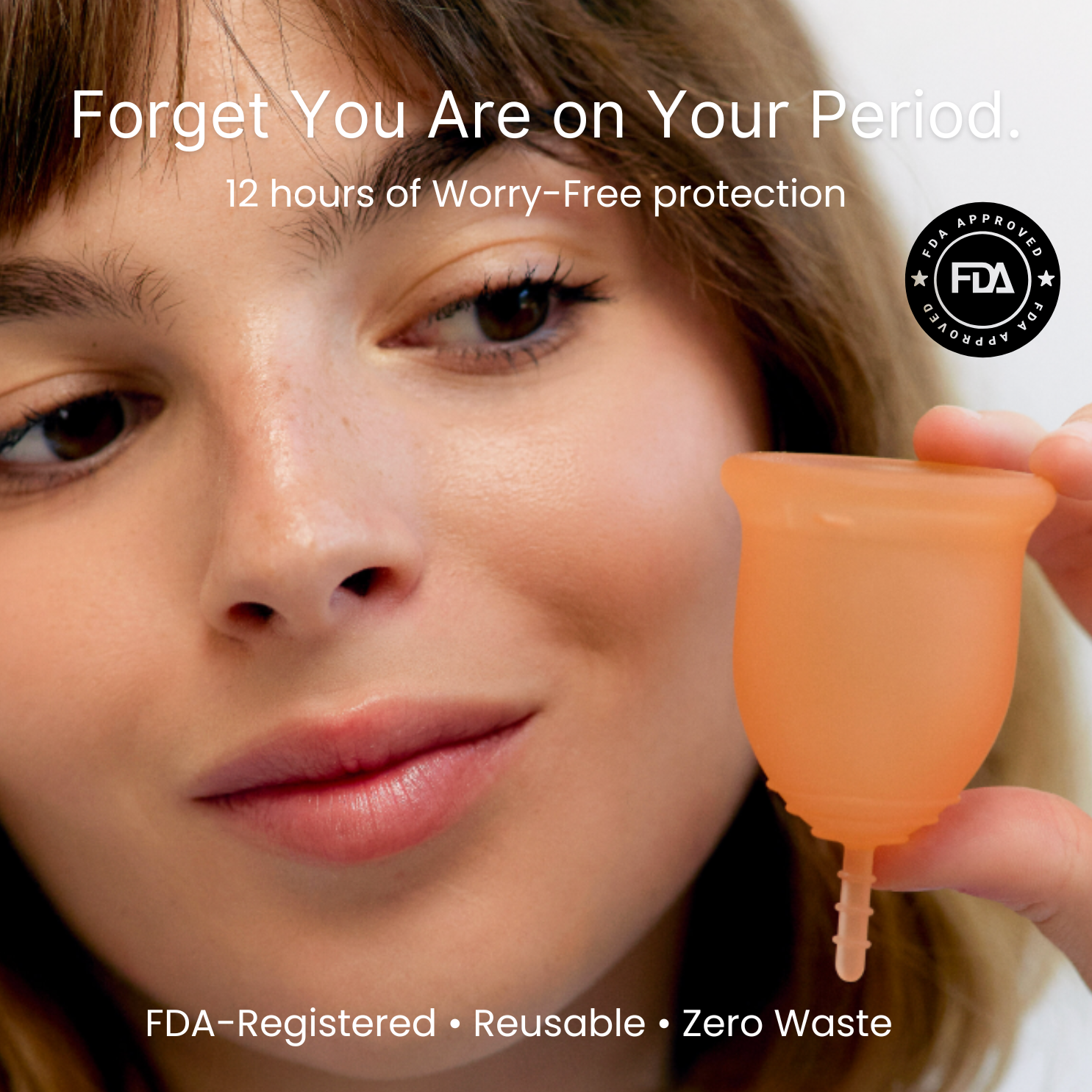 Woman holding a menstrual cup with text about 12 hours of worry-free protection and FDA approval.